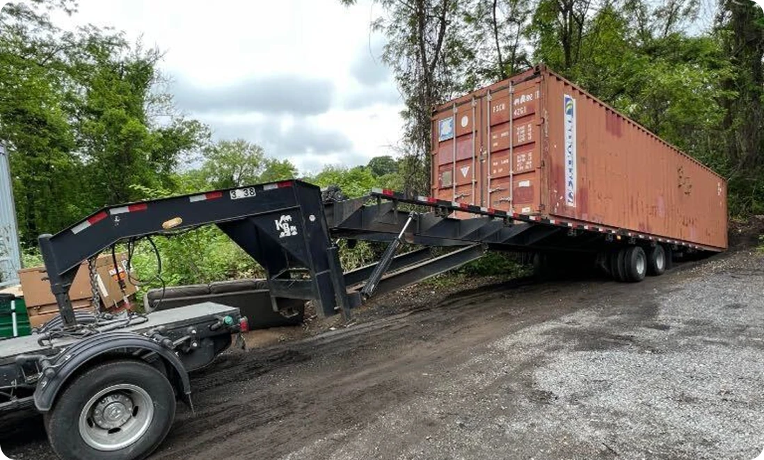 delivery truck accessing container site
